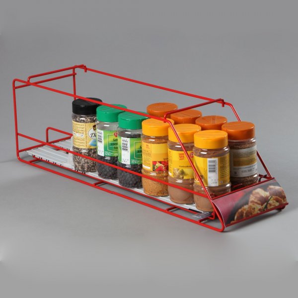 Présentoir linéaire avec poussoir pour comptoir